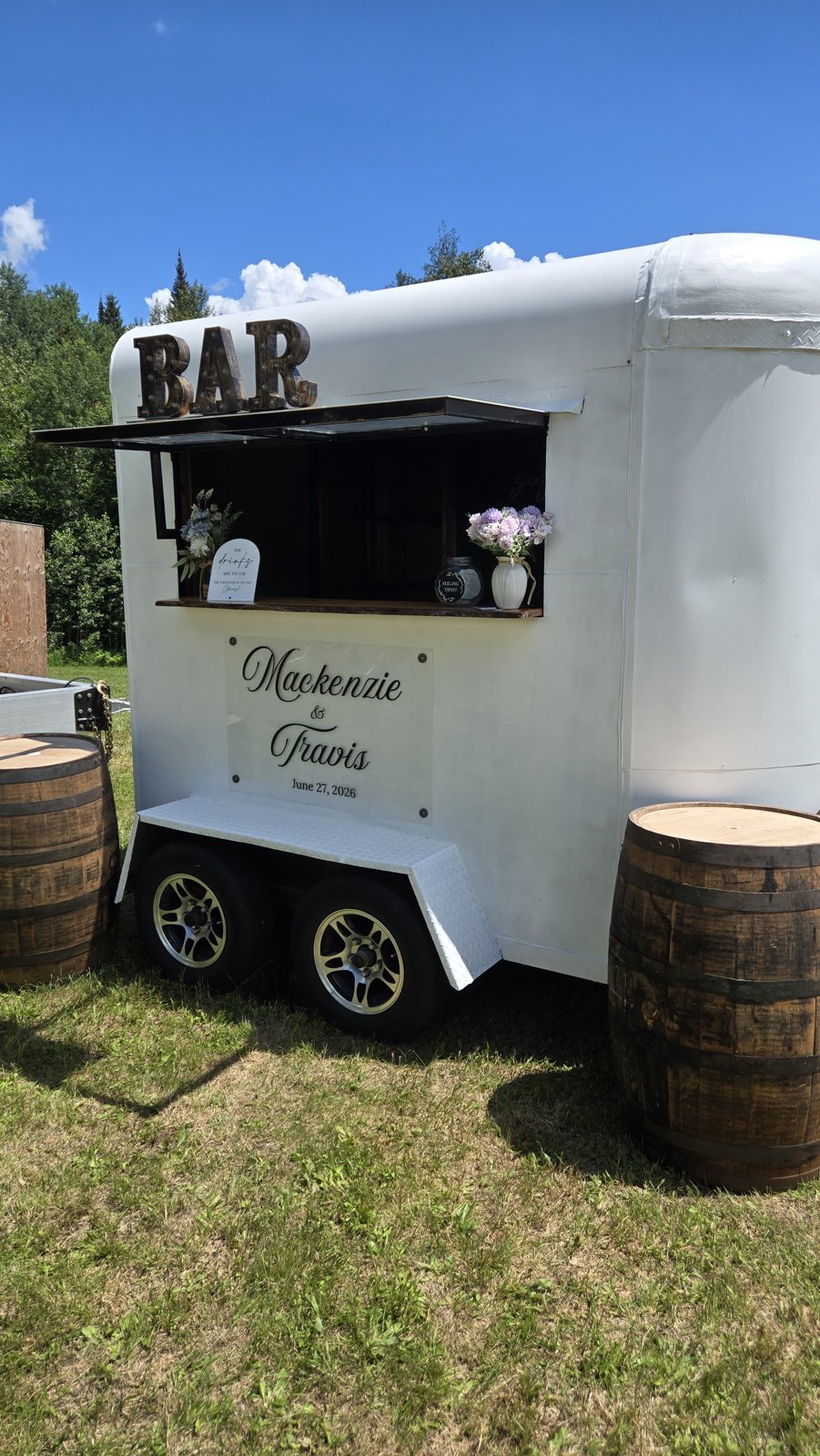 Travelling Spirits bar beside a wedding tent in Tamworth, Ontario